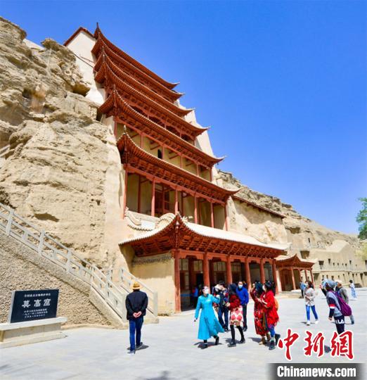 5月10日,世界文化遗产敦煌莫高窟因疫情防控暂停108天后首日恢复对外开放。(资料图) 孙志军 摄 5月10日,世界文化遗产敦煌莫高窟因疫情防控暂停108天后首日恢复对外开放。(资料图) 孙志军 摄